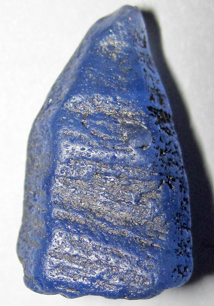 Rough blue sapphire crystal from a gem gravel mine in the Ratnapura area
